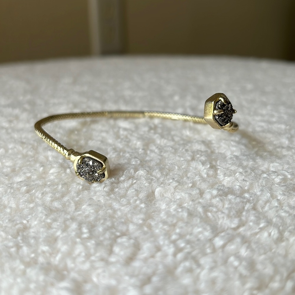 Kendra Scott bracelet.